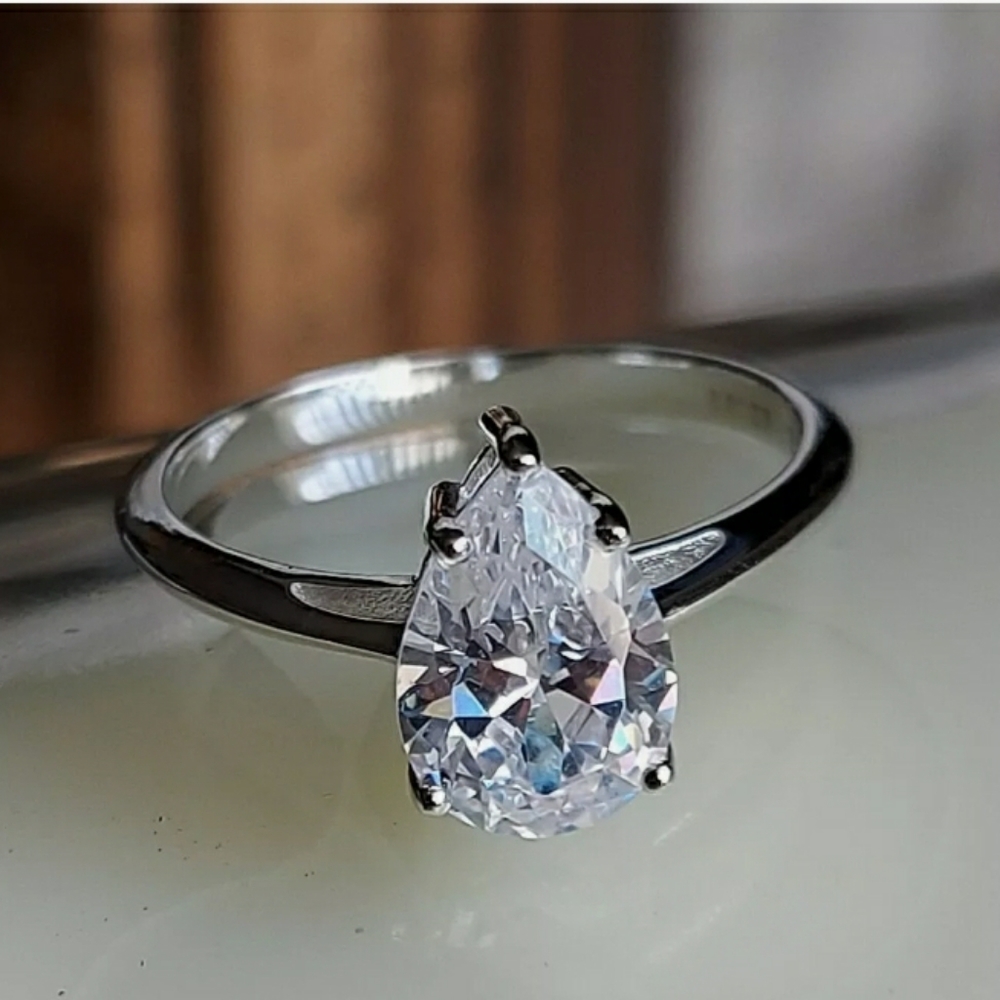 $950. 2CT Pear Cut 14k White Gold Simulated Solitaire Diam